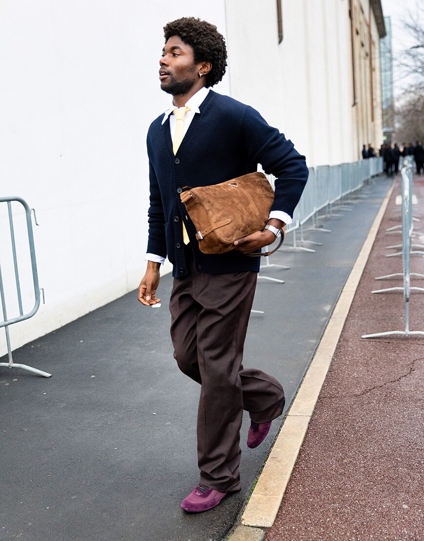Man wearing navy knit jumper and suede bag | ASOS Style Feed