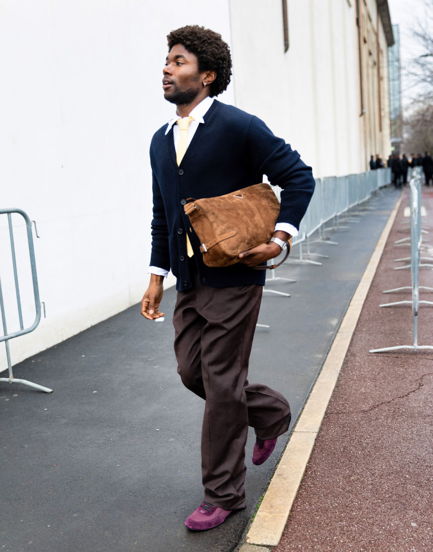Model wearing a green cardigan