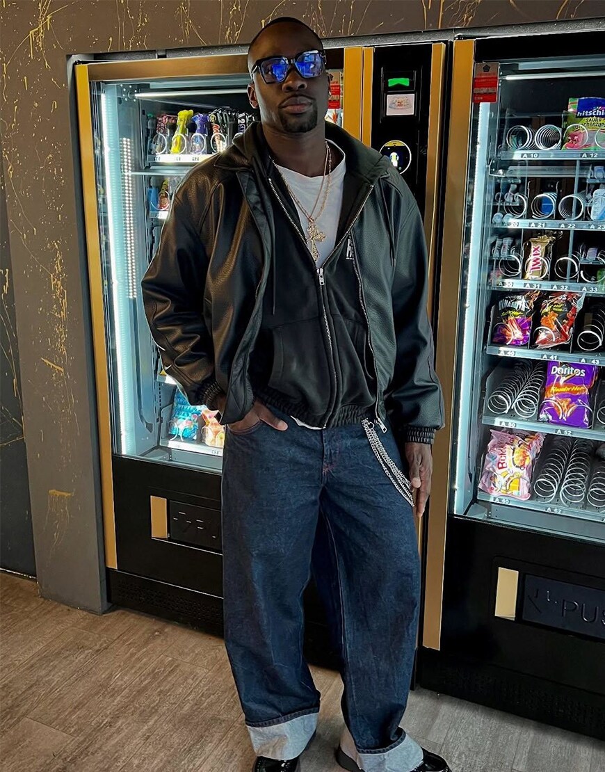 Man standing in front of vending machines