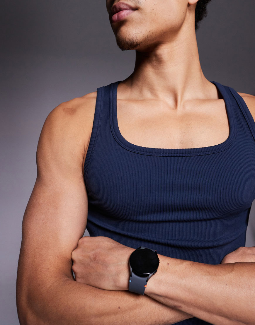 Man Wearing Muscle Fit Top
