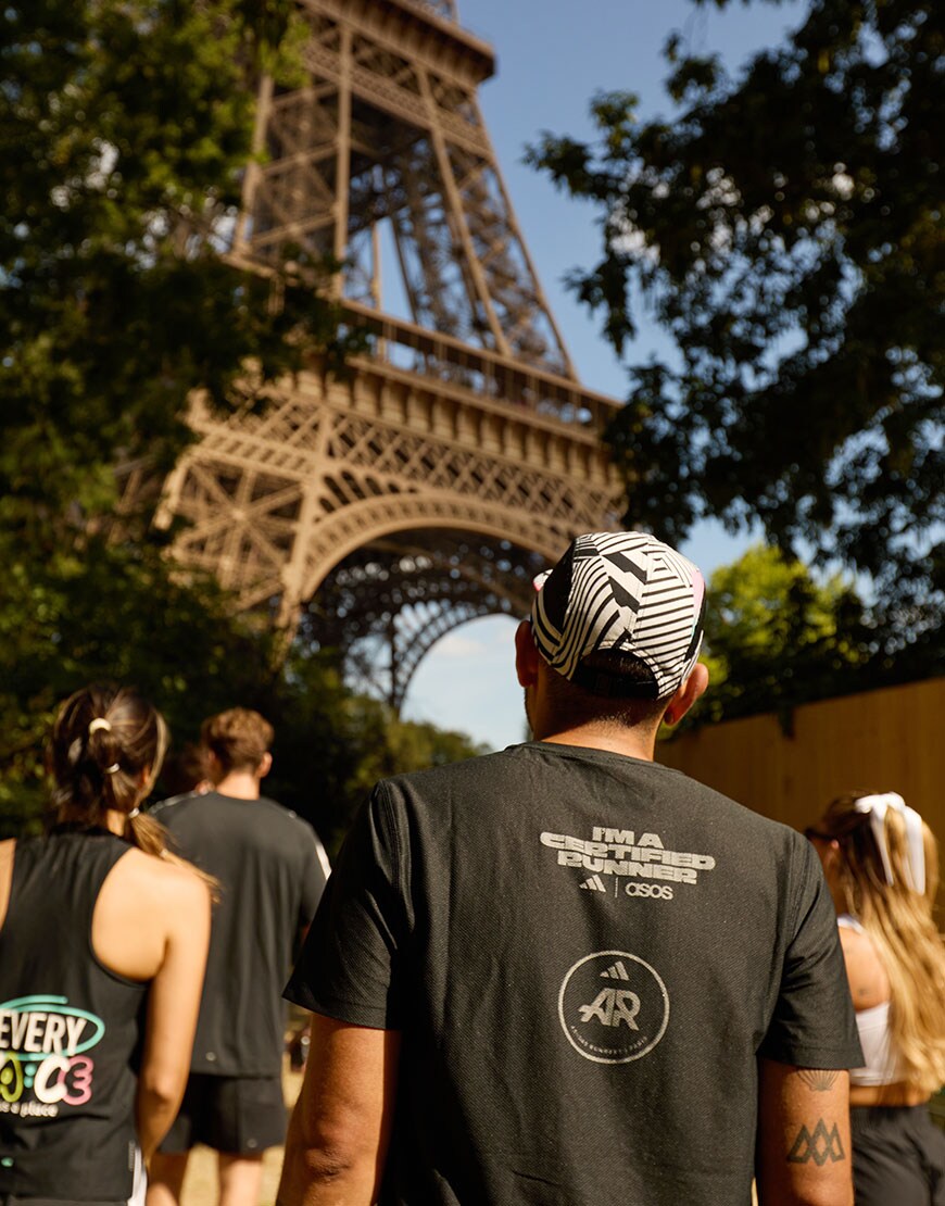 Man looking towards the Eiffel Tower