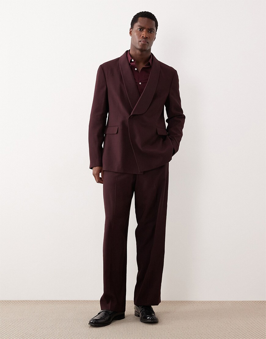 Model in a burgundy double-breasted suit