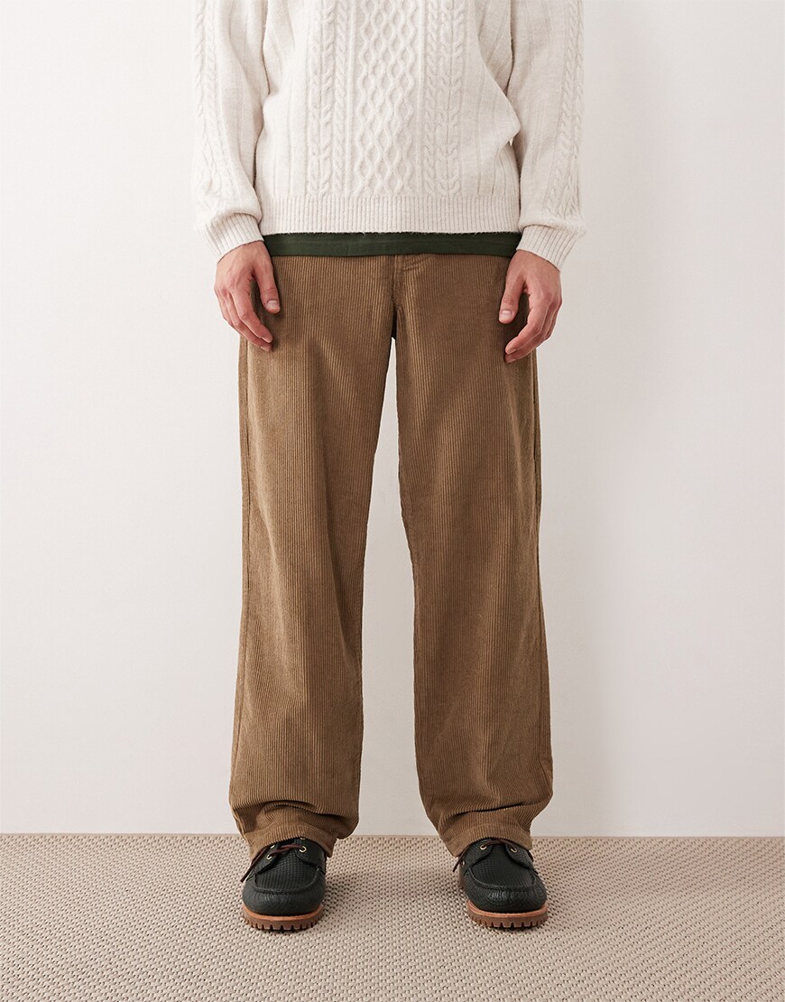Man wearing camel corduroy trousers