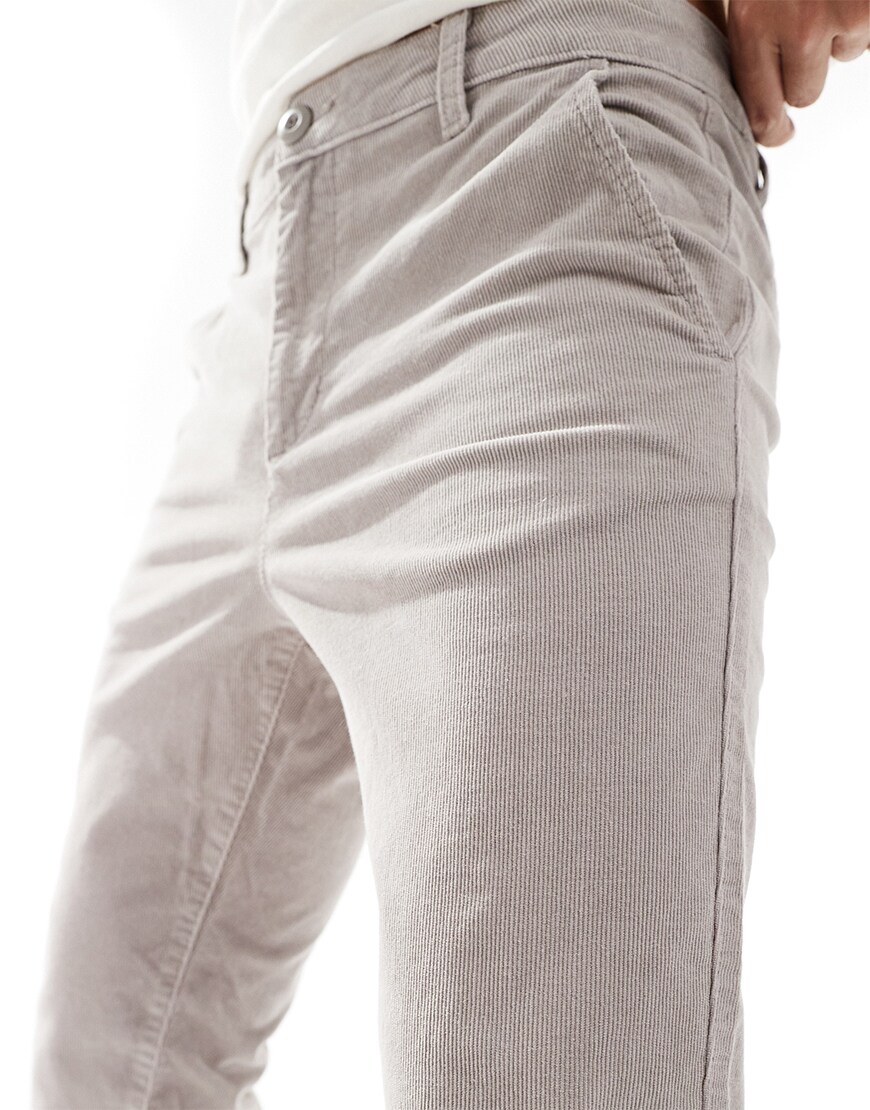 Closeup of man wearing corduroy trousers