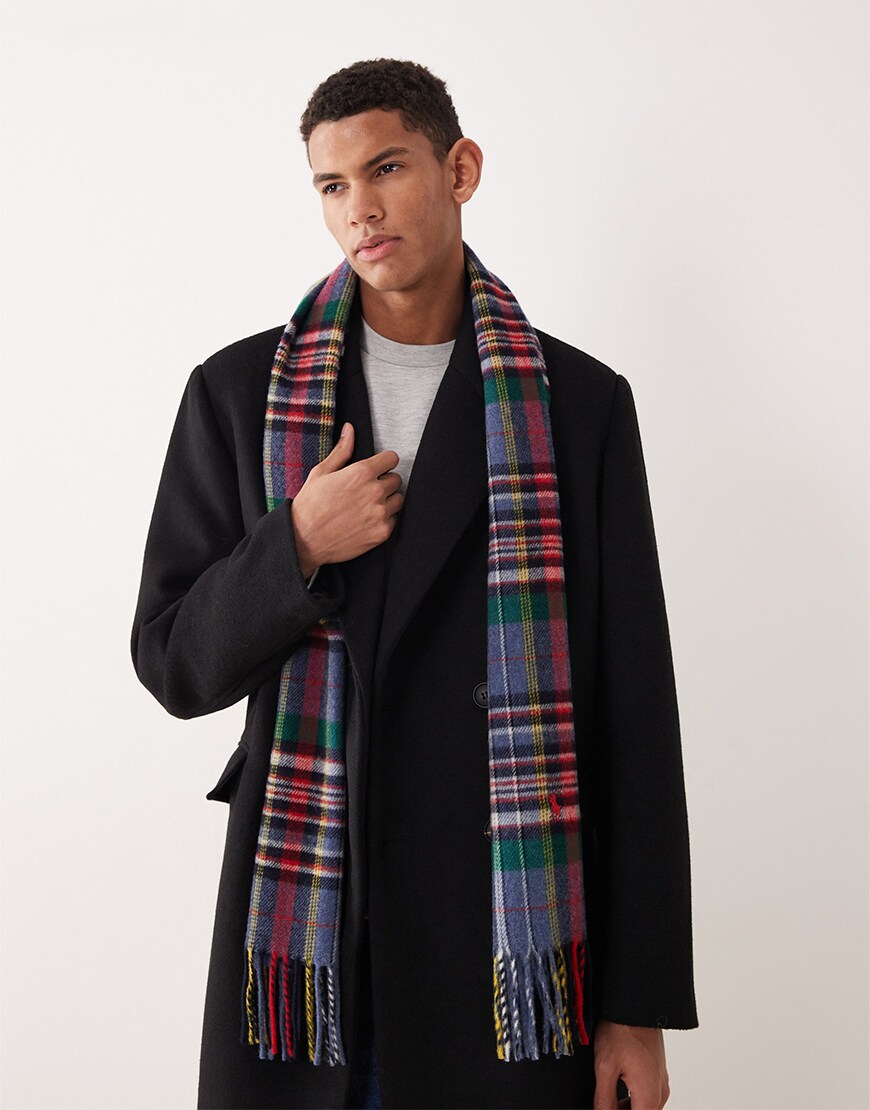 Man wearing a tartan scarf