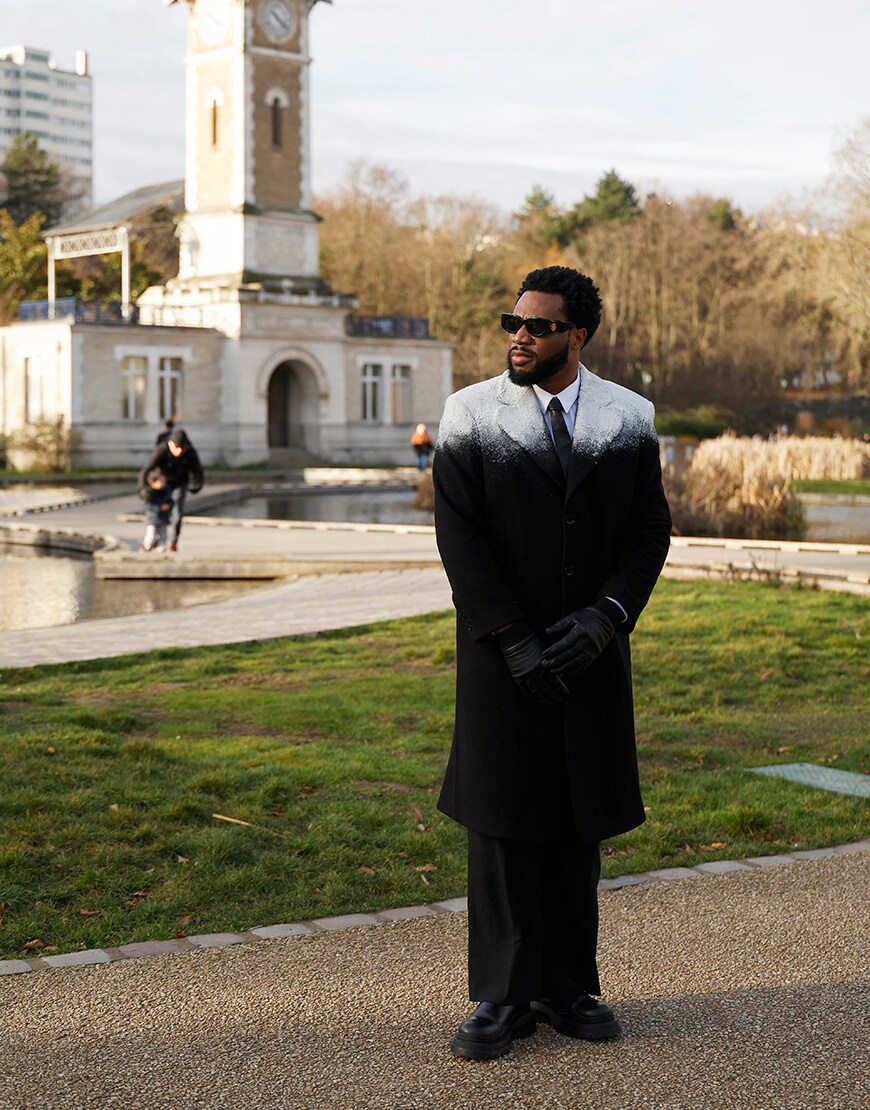 Man wearing black wool coat with white shoulders | ASOS Style Feed