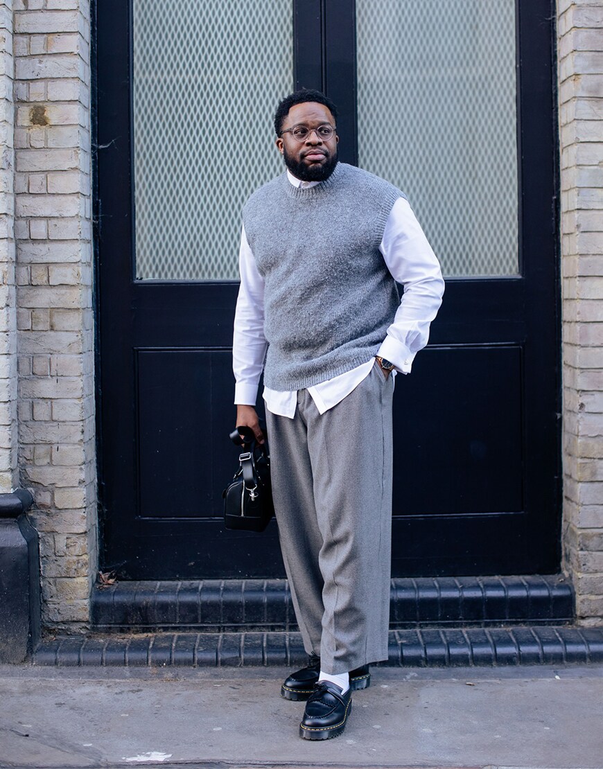 Man wearing a grey jumper