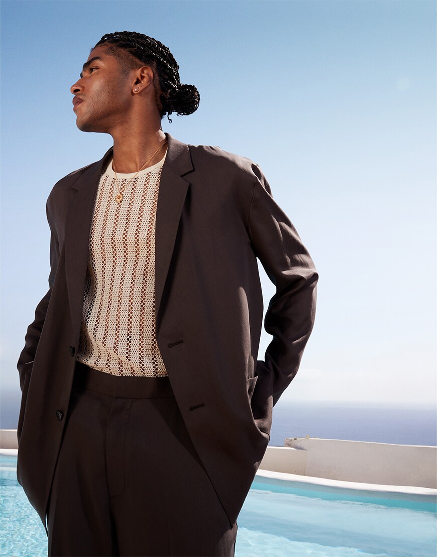 Man wearing a brown suit