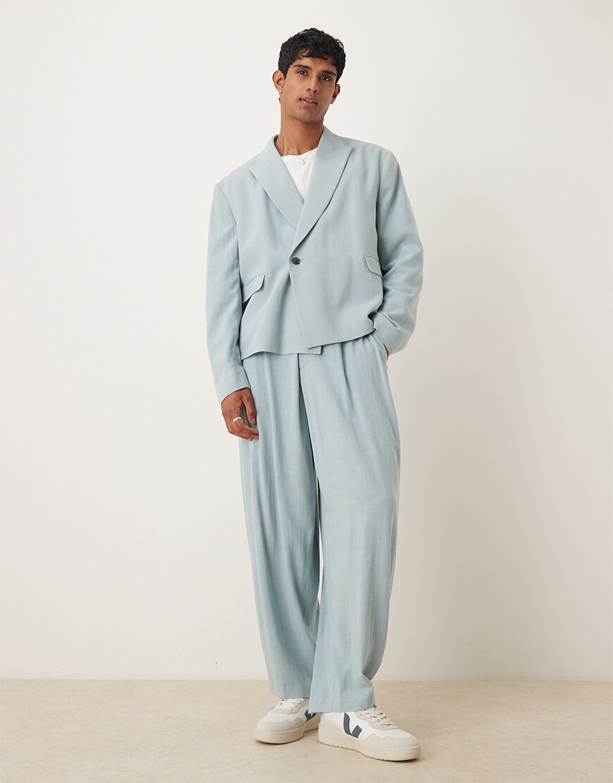 Man wearing a pastel blue suit