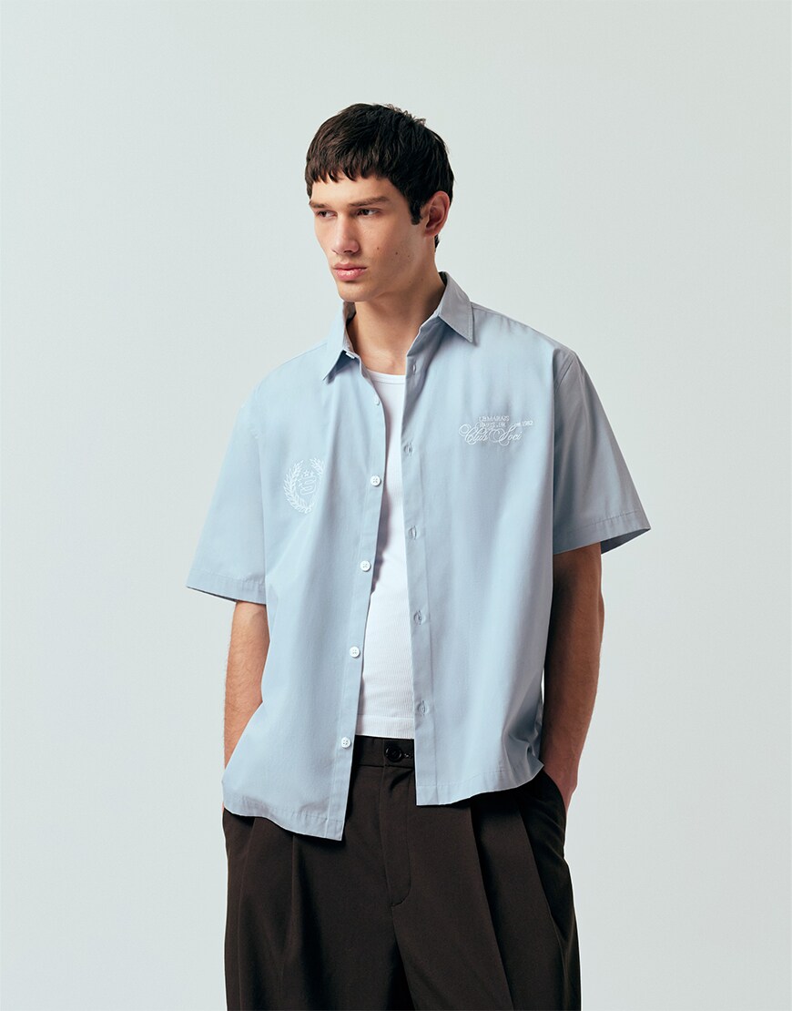 Man wearing a blue shirt