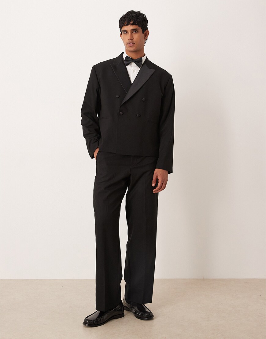 Man wearing a black suit