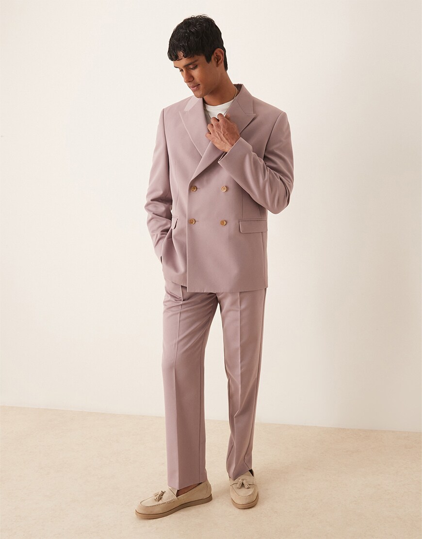 Man wearing a pink suit