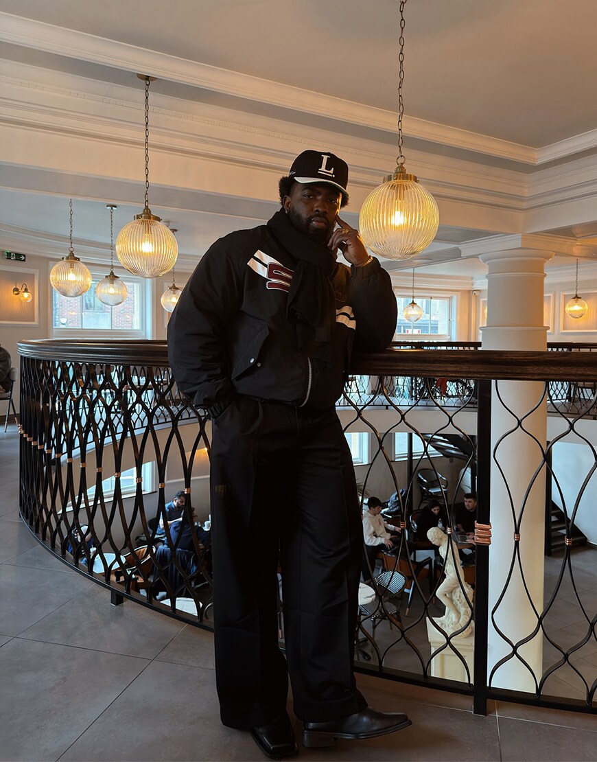 Man wearing an all-black outfit