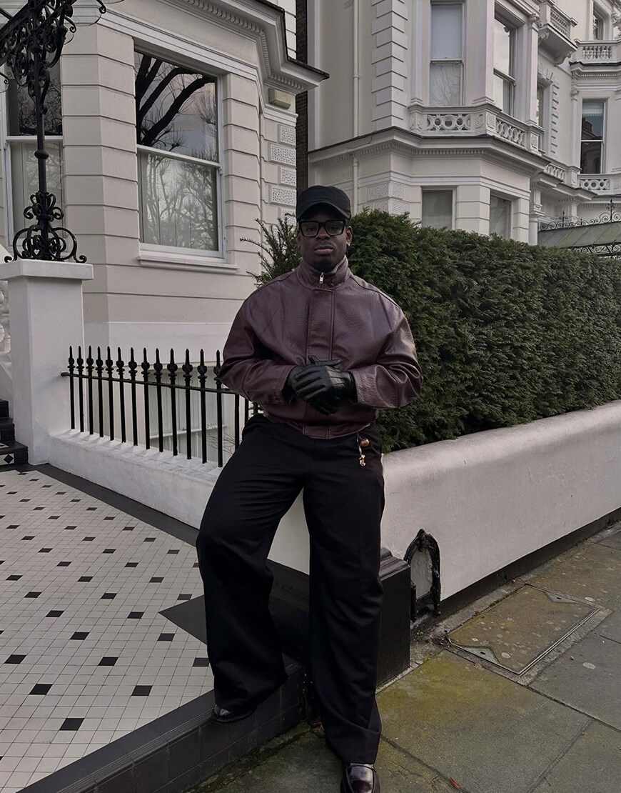 Man wearing a burgundy jacket