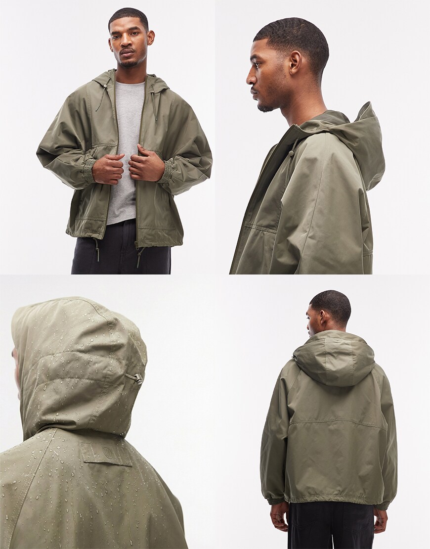 Man wearing a khaki track jacket