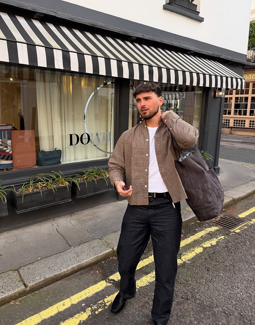 Man wearing a brown shirt