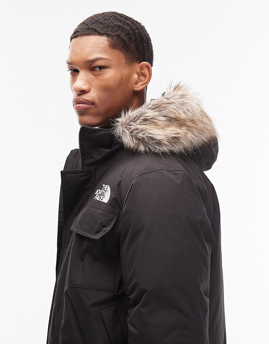 The North Face McMurdo faux fur hooded down bomber in black | ASOS Style Feed