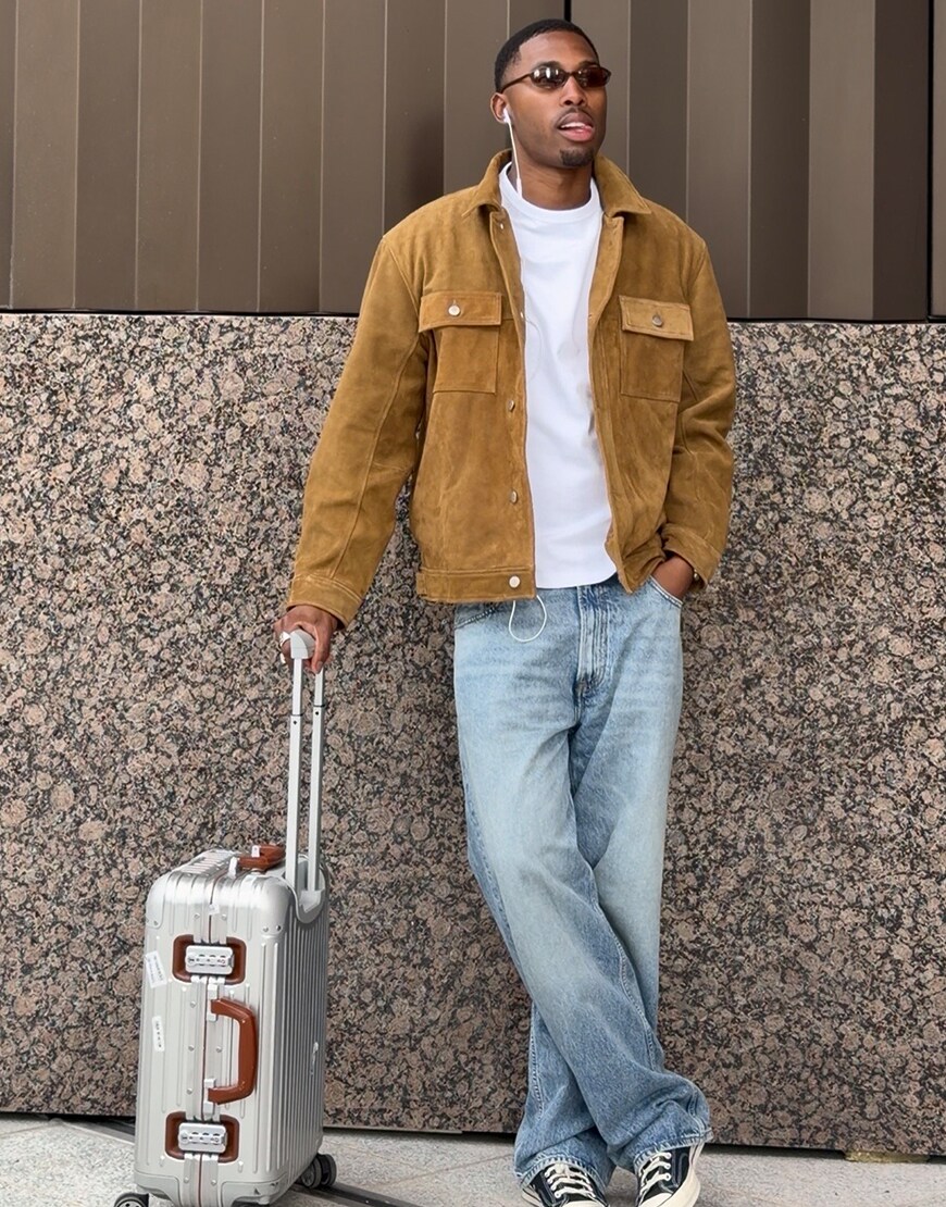 Man holding a suitcase
