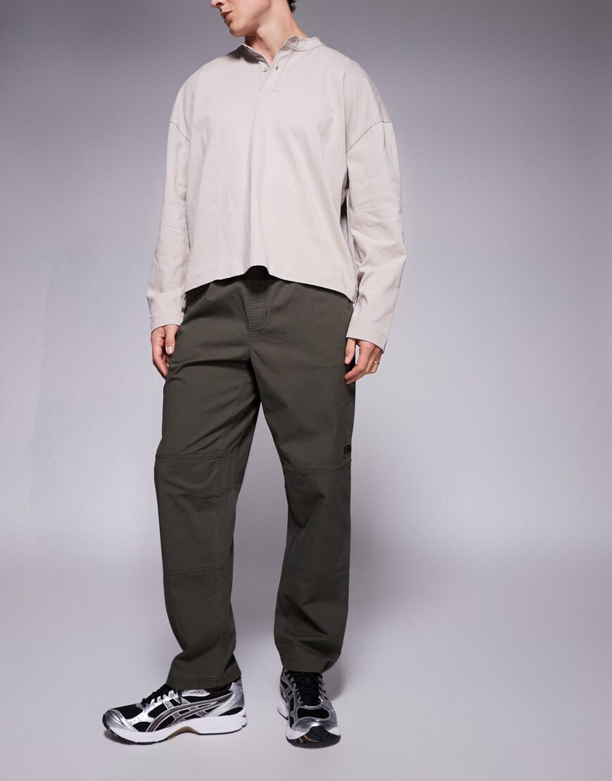 model wearing green trousers|ASOS Style Feed