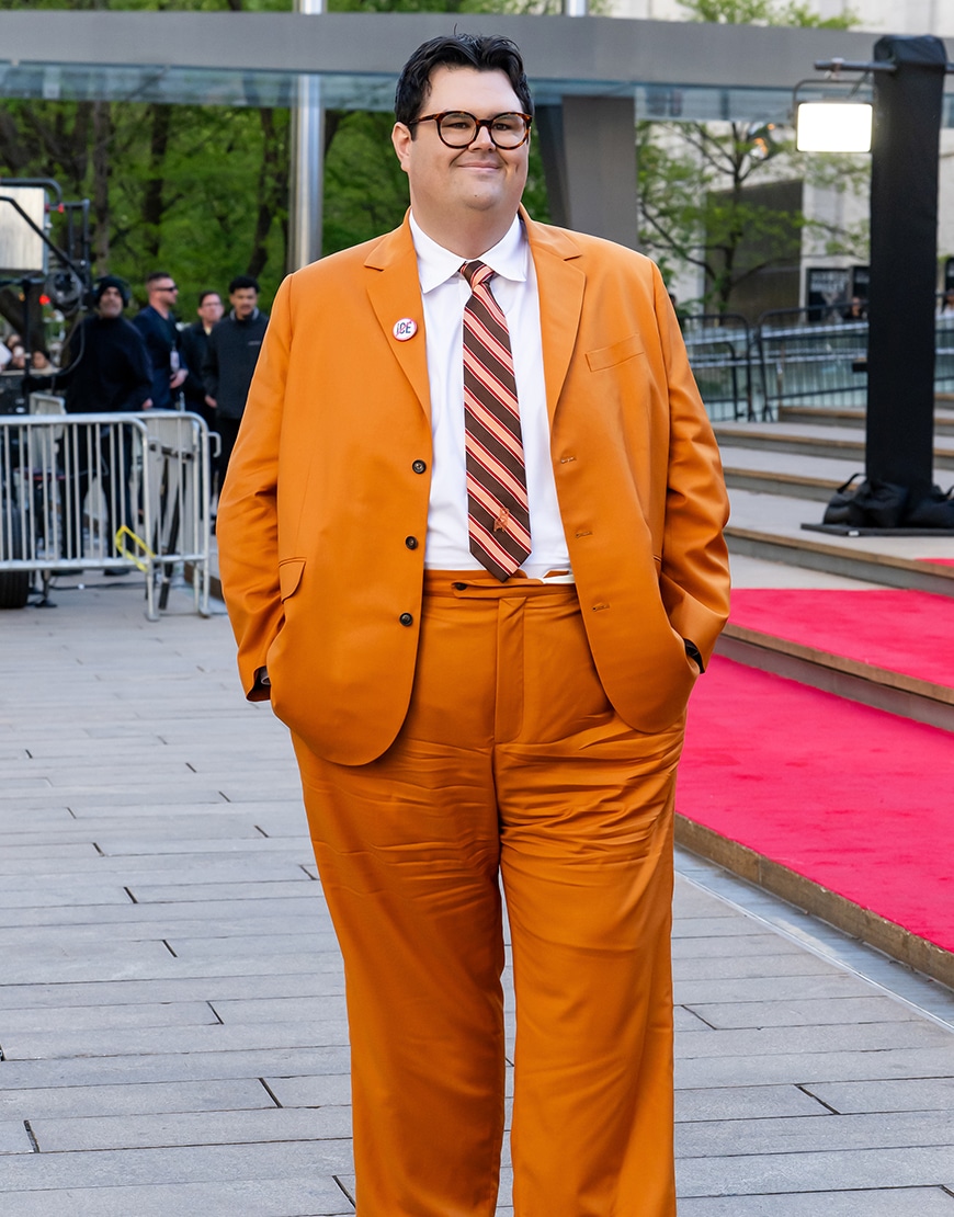 Caleb Hearon wearing an orange suit