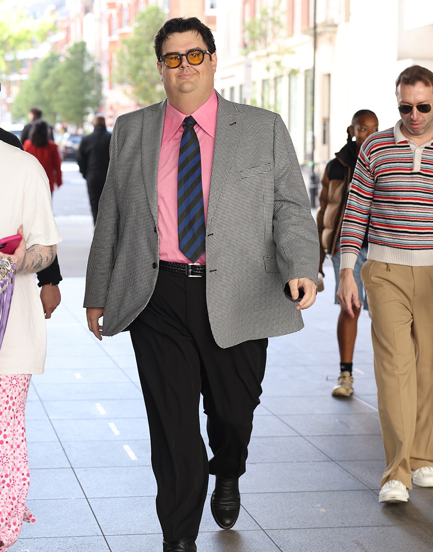 Caleb Hearon wearing a check blazer