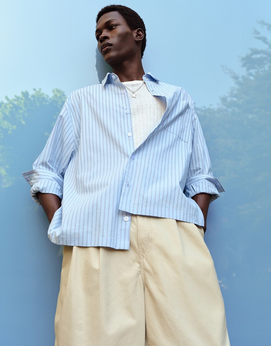 Man wearing striped shirt and tailored trousers | ASOS Style Feed