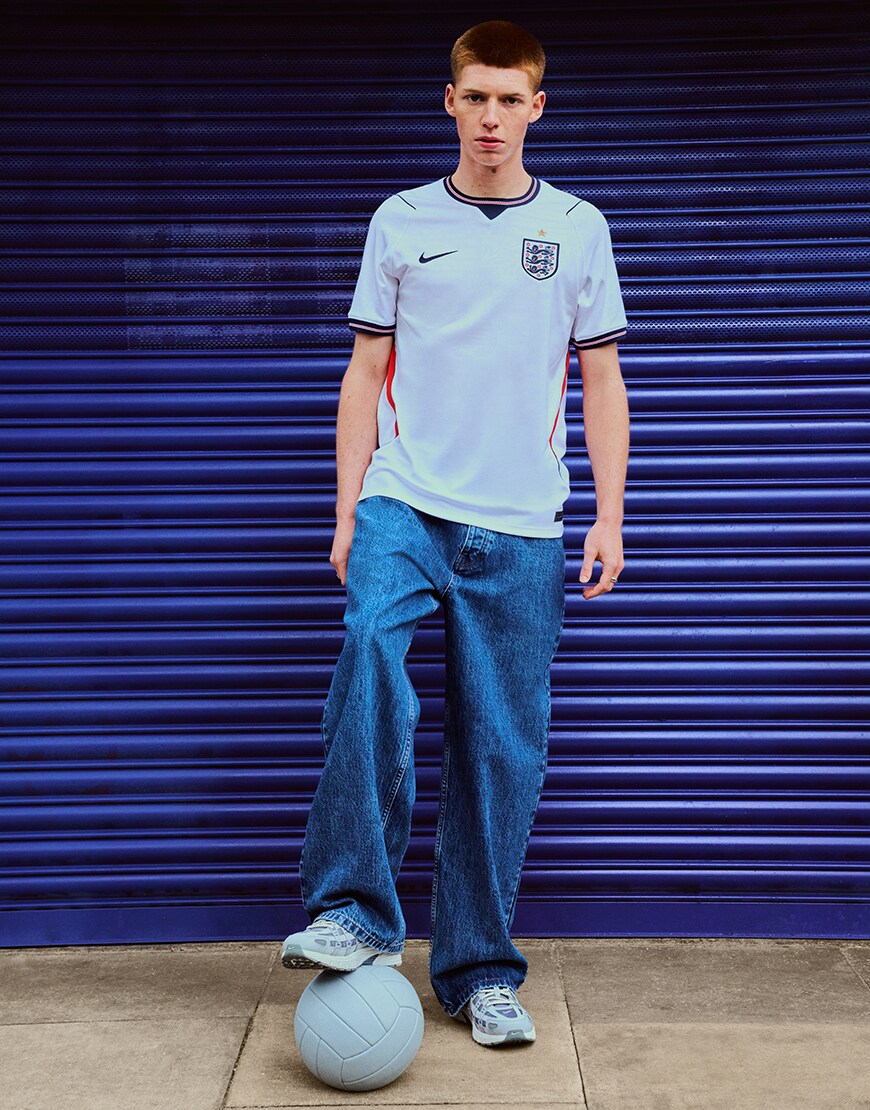 Man wearing the England football shirt
