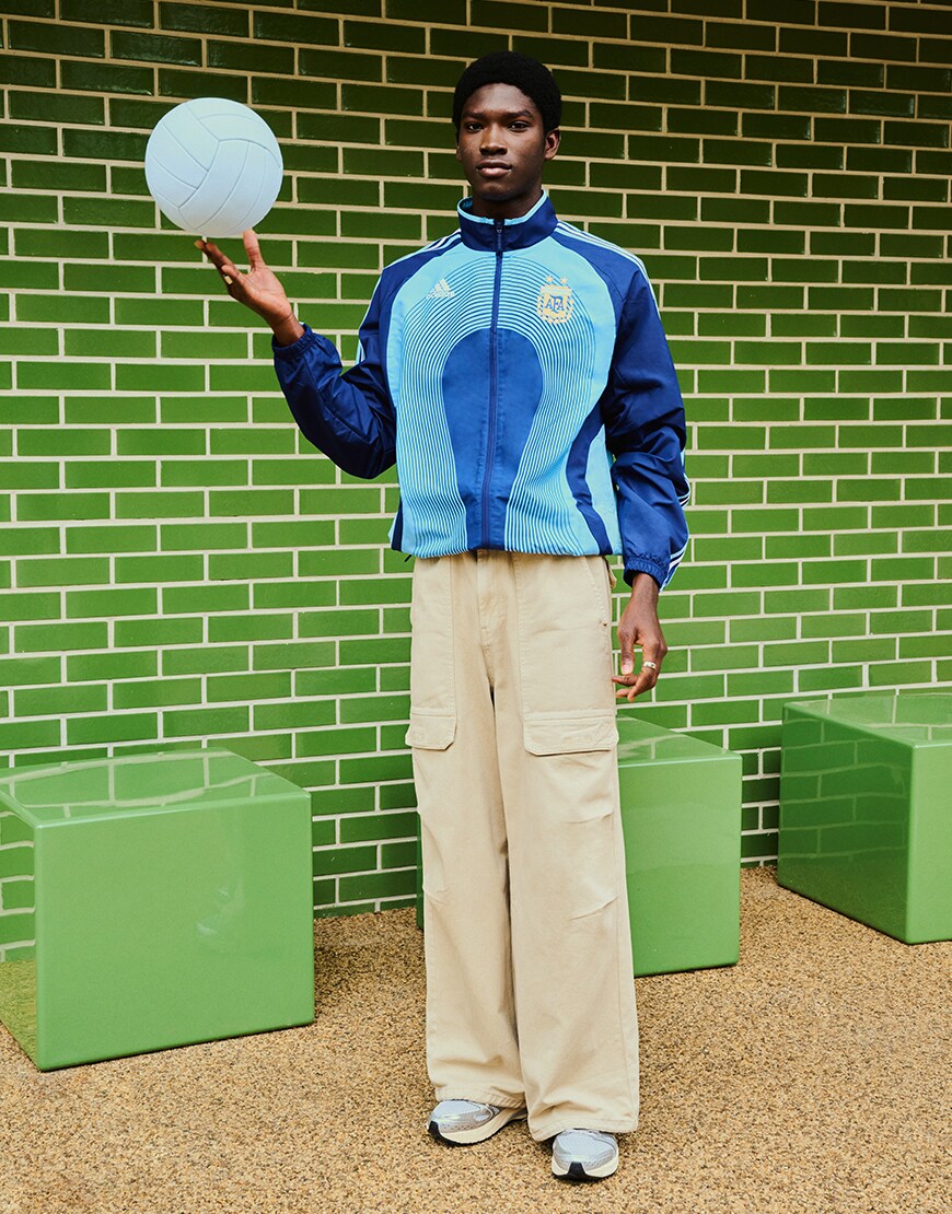 Man wearing a football track jacket