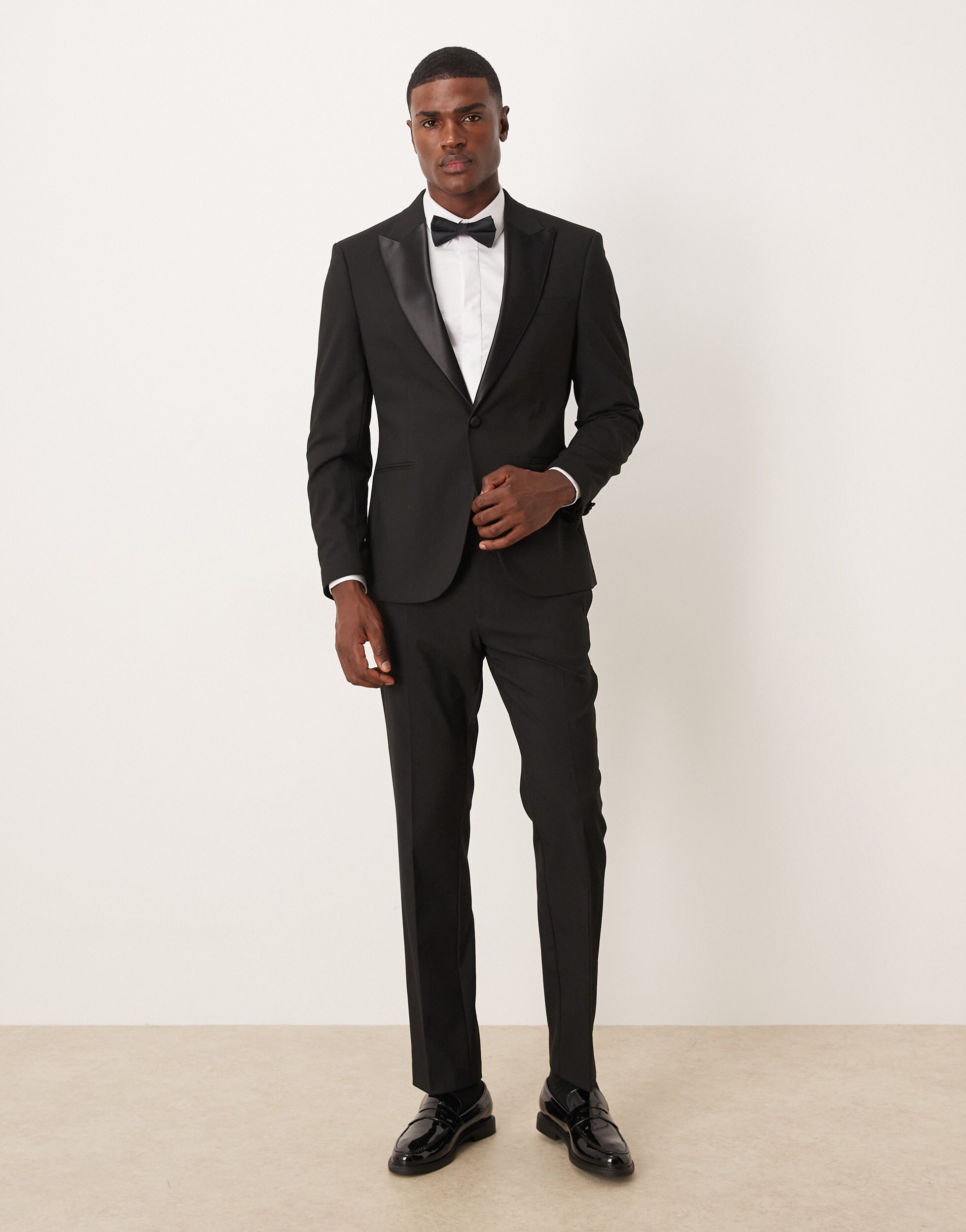 A man wearing a black tuxedo | ASOS 