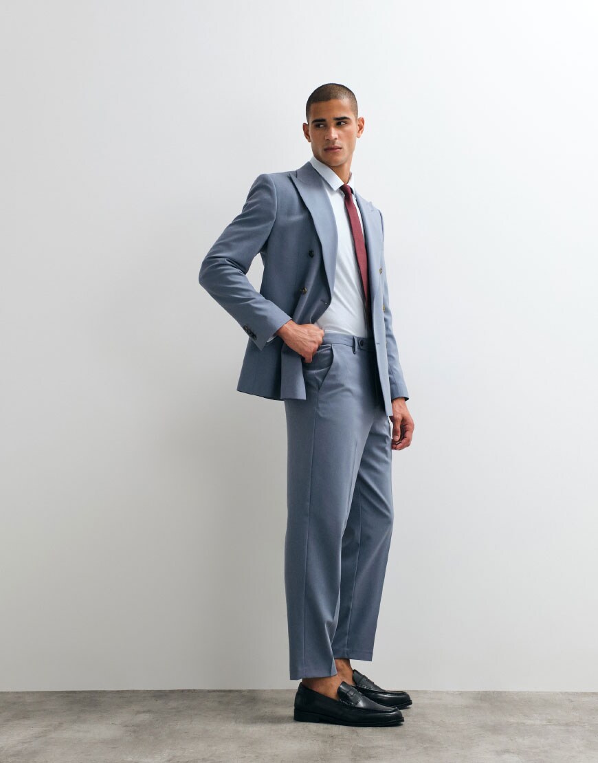 A man wearing a blue double breasted suit | ASOS