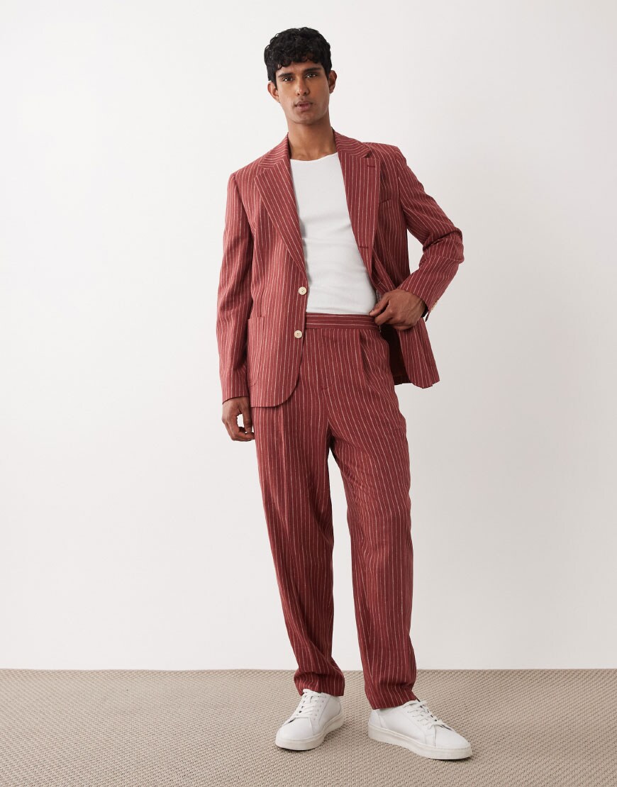 A man wearing a red pinstripe suit | ASOS