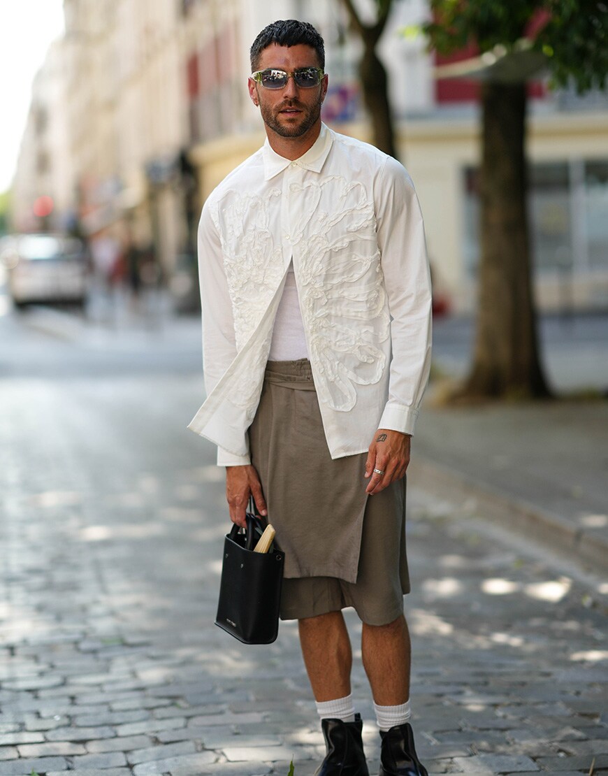 Man wearing small leather bag and green sunglasses | ASOS Style Feed