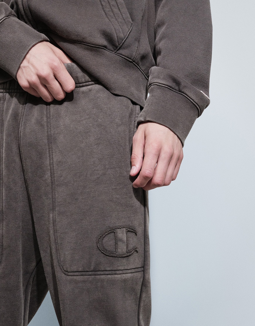 Man wearing chocolate brown Champion tracksuit | ASOS Style Feed