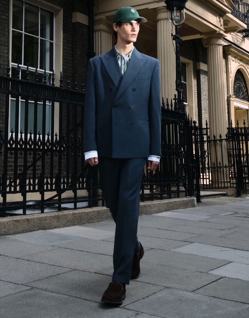 Man wearing navy suit and green cap | ASOS Style Feed