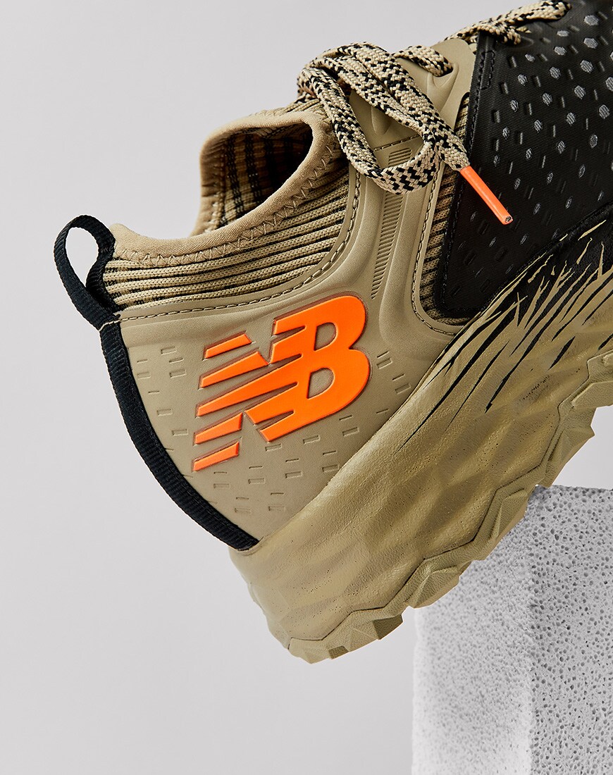A picture of a New Balance trail-running trainer. Available on ASOS.