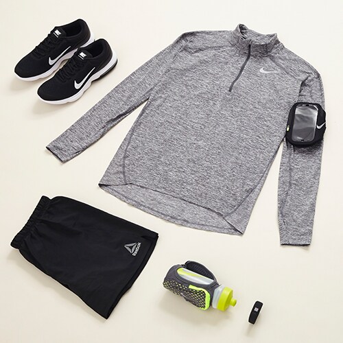 The perfect summer workout outfit, featuring a grey Nike top, black Reebok shorts and black Nike trainers | ASOS Style Feed