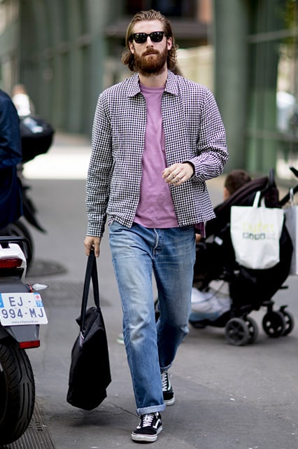 A street-styler wearing a purple T-shirt, Harrington jacket and skater jeans | ASOS Style Feed