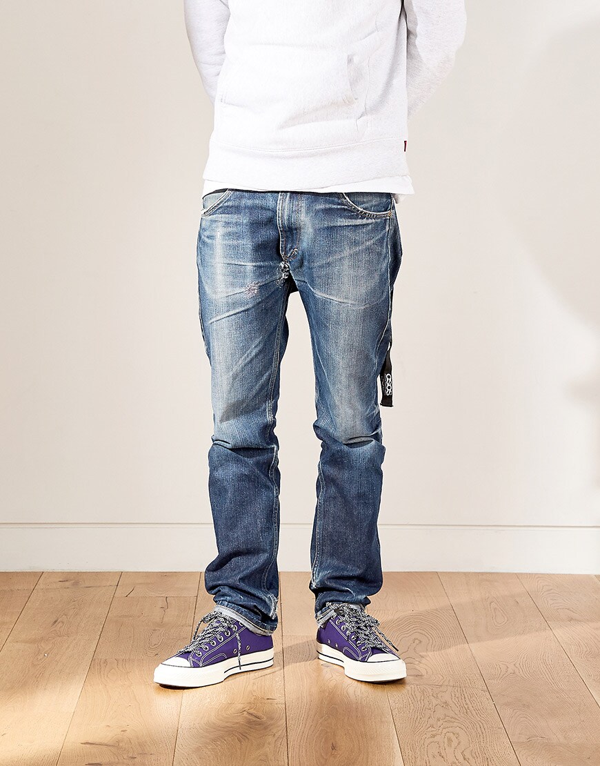 Nic wearing a hoodie, jeans and purple Converse available at ASOS | ASOS Style Feed