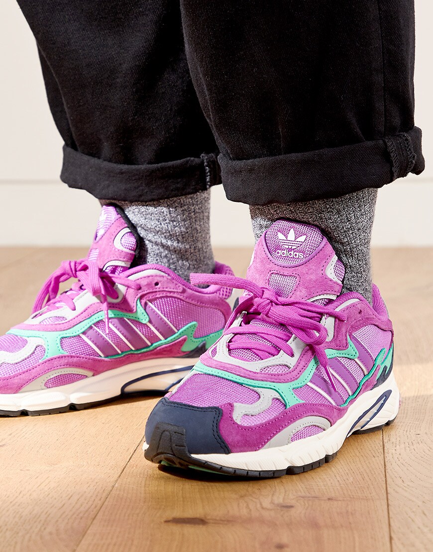 A close-up of Emma's purple adidas trainers available on ASOS | ASOS Style Feed