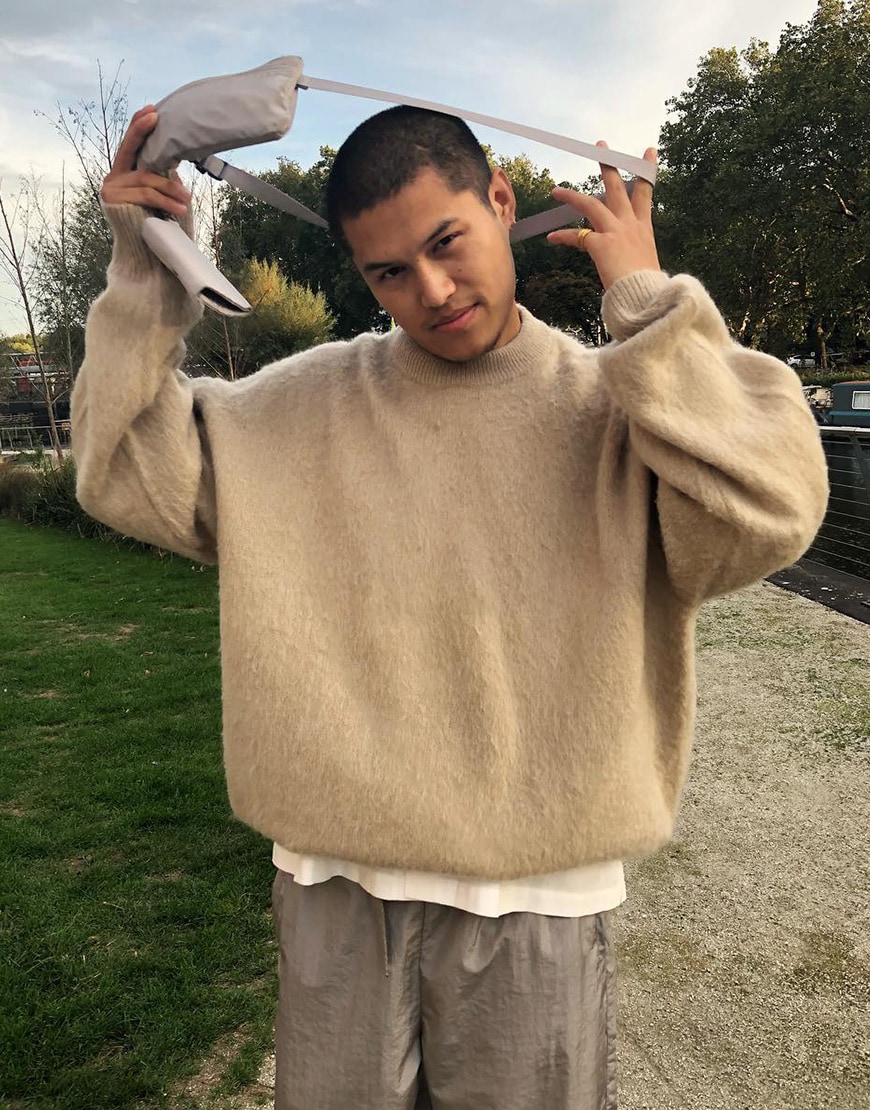 A picture of an ASOS Insider wearing a tonal outfit.