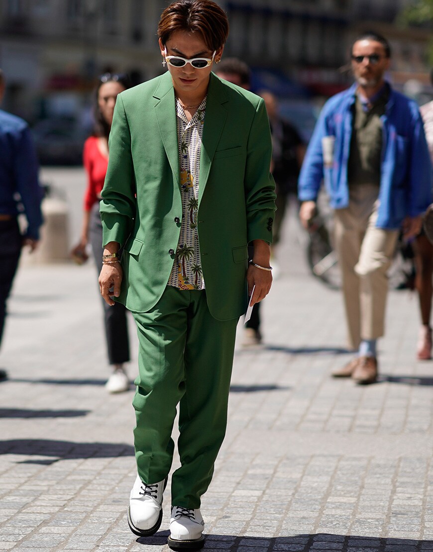 A street styler in a bold suit