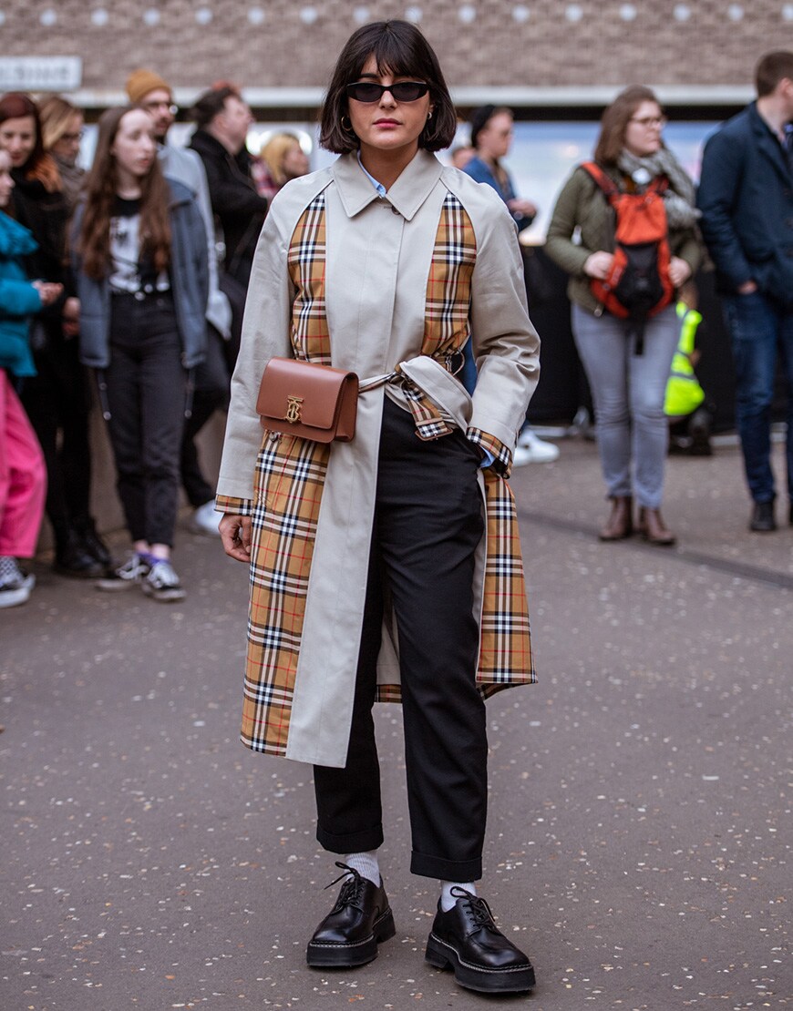 A picture of a female street styler wearing a mac.