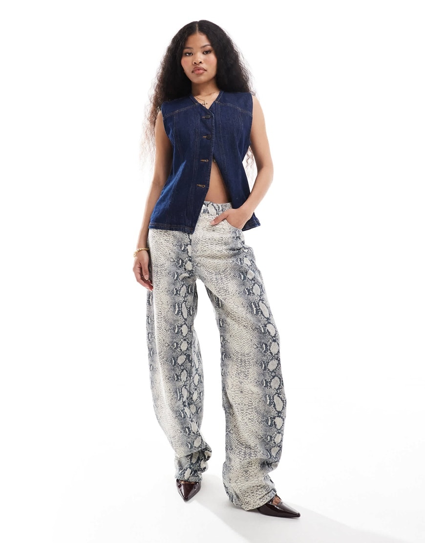 A woman wearing snake print jeans | ASOS Style Feed