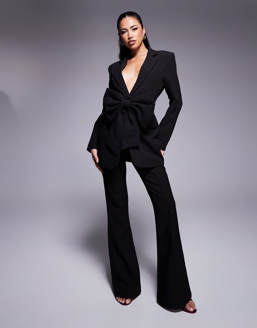 A woman wearing a black suit | ASOS Style Feed
