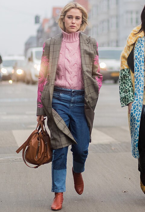 Annabel Rosendahl wearing pink jumper, embroidered blazer, patchwork jeans and brown bag | ASOS Fashion & Beauty Feed