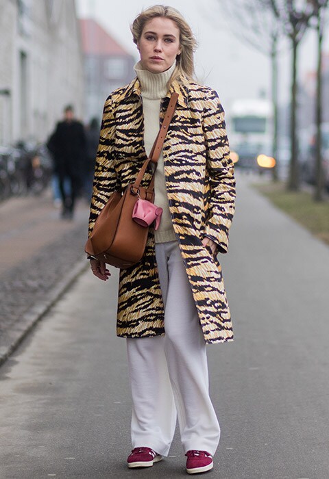 Blogger Annabel Rosendahl wearing animal-print jacket, cream trousers and brown bag | ASOS Fashion & Beauty Feed