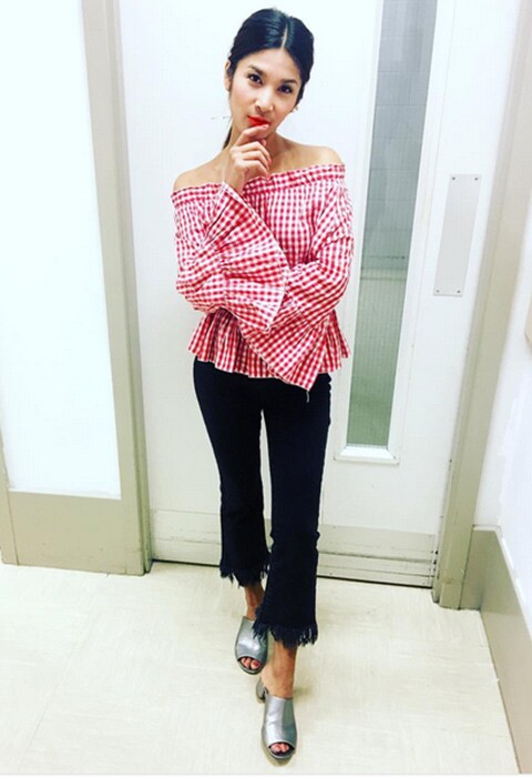 Blogger wearing mules and ruffled hem