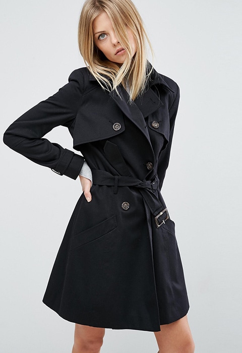Model wearing black ASOS classic trench coat, available at ASOS | ASOS Fashion & Beauty Feed
