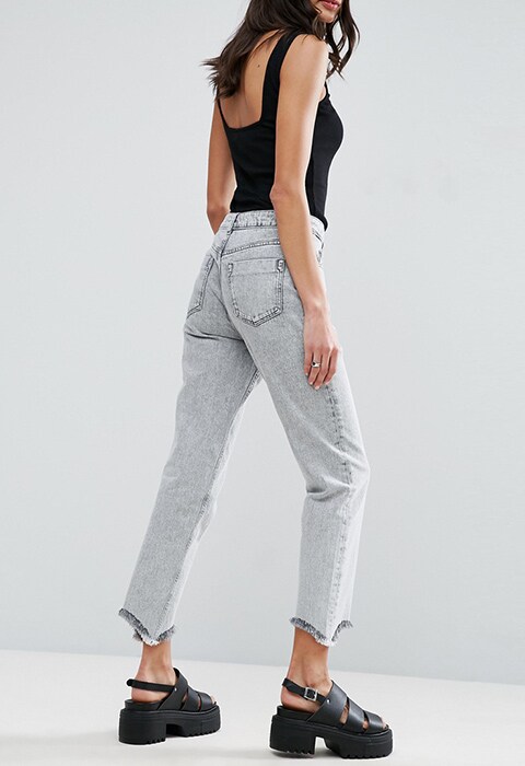 ASOS mom jeans in Percy black acid wash with arched raw hem, available at ASOS | ASOS Fashion & Beauty Feed
