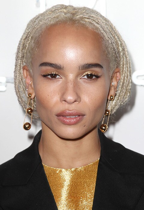 Zoë Kravitz with a gold beauty look and matching earrings | ASOS Fashion & Beauty Feed
